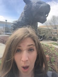 Rebecca gasps as the statue of the school's Bengal tiger looks like it's about to claw her head off.