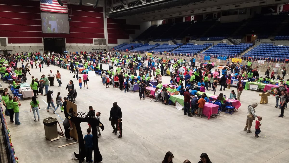 An view of all the booths shows dozens of community members stopping by.