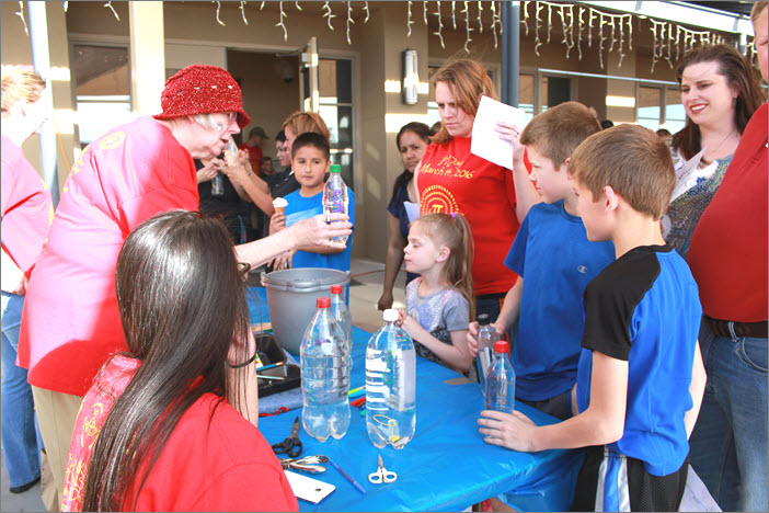 Kids are about to test out their Cartesian divers outside.